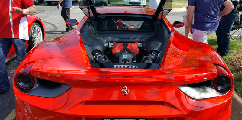 Animated Owner looked like Weird Al Yankovic and was decked out in Ferrari Gear as expected